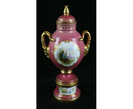 A late 19th/early 20th Century Continental porcelain twin handled lidded vaseHaving hand-painted decoration depicting a lady 