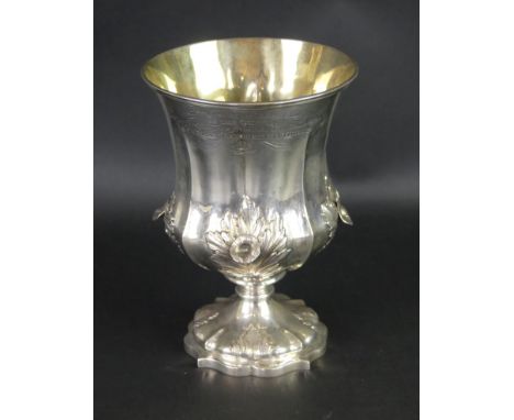 A William IV silver presentation wine gobletOf fluted form, adorned with nasturtium style flowers and leaves, on a shaped cir