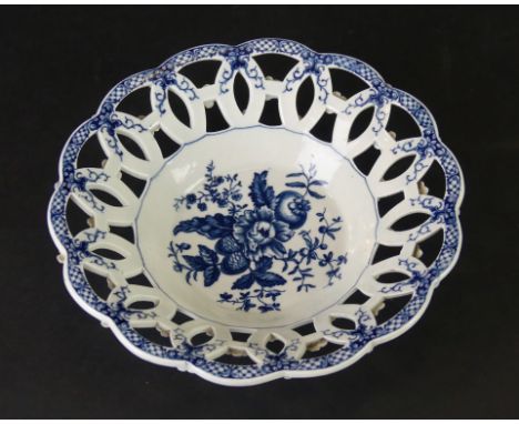 An 18th Century Worcester blue and white basketHaving pierced rim outside a central panel decorated in the 'Pine Cone' patter