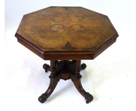 An octagonal walnut inlaid centre table, late 19th CenturyTop inlaid with floral decoration, raised on four turned column sup