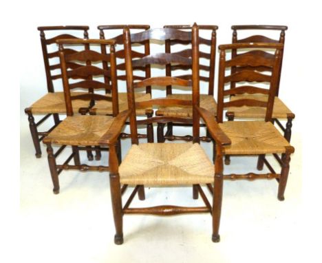 A set of six 19th Century ladder back dining chairs together with a further ladder back carver chairSix ladder backs with sol