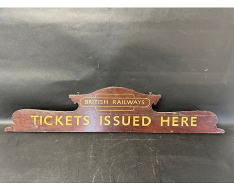 A British Railways 'Tickets Issued Here' hanging wooden ticket headboard, GWR marking on reverse see pics, 41 3/4 x 8 3/4". 