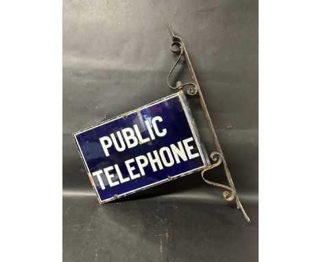 A Public Telephone double sided enamel sign on original bracket, enamel: 18 x 12", with frame 20 1/2 x 30", 
