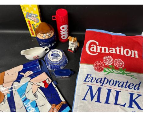 A selection of kitchen advertising including a Tetley biscuit barrel, Tetley aprons (2), Tetley oven glove, Bisto gravy jug, 