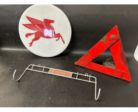 A Pegasus disc, 12" diameter, a warning triangle and a JWP Service Tools Brake Bleeder wall hanging rack. 
