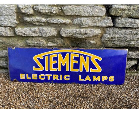 A Siemens Electric Lamps enamel advertising sign, carefully trimmed from larger sign, 37 x 11 1/2". 