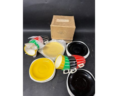 Two 1960s Welware picnicware sets each comprising four cups, four saucers and four tea plates. One set complete with original