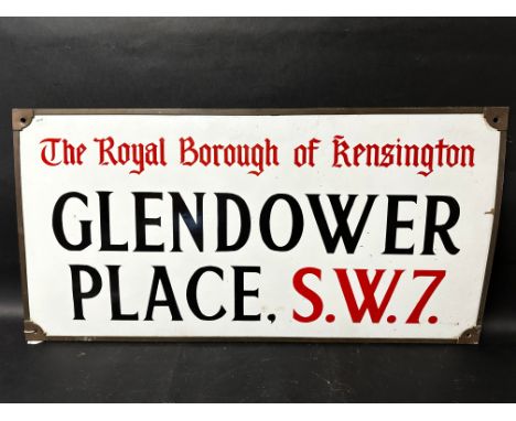 A Royal Borough of Kensington Glendower Place S.W.7 enamel sign held within original metal bracket, 32 1/4 x 16 1/4". 
