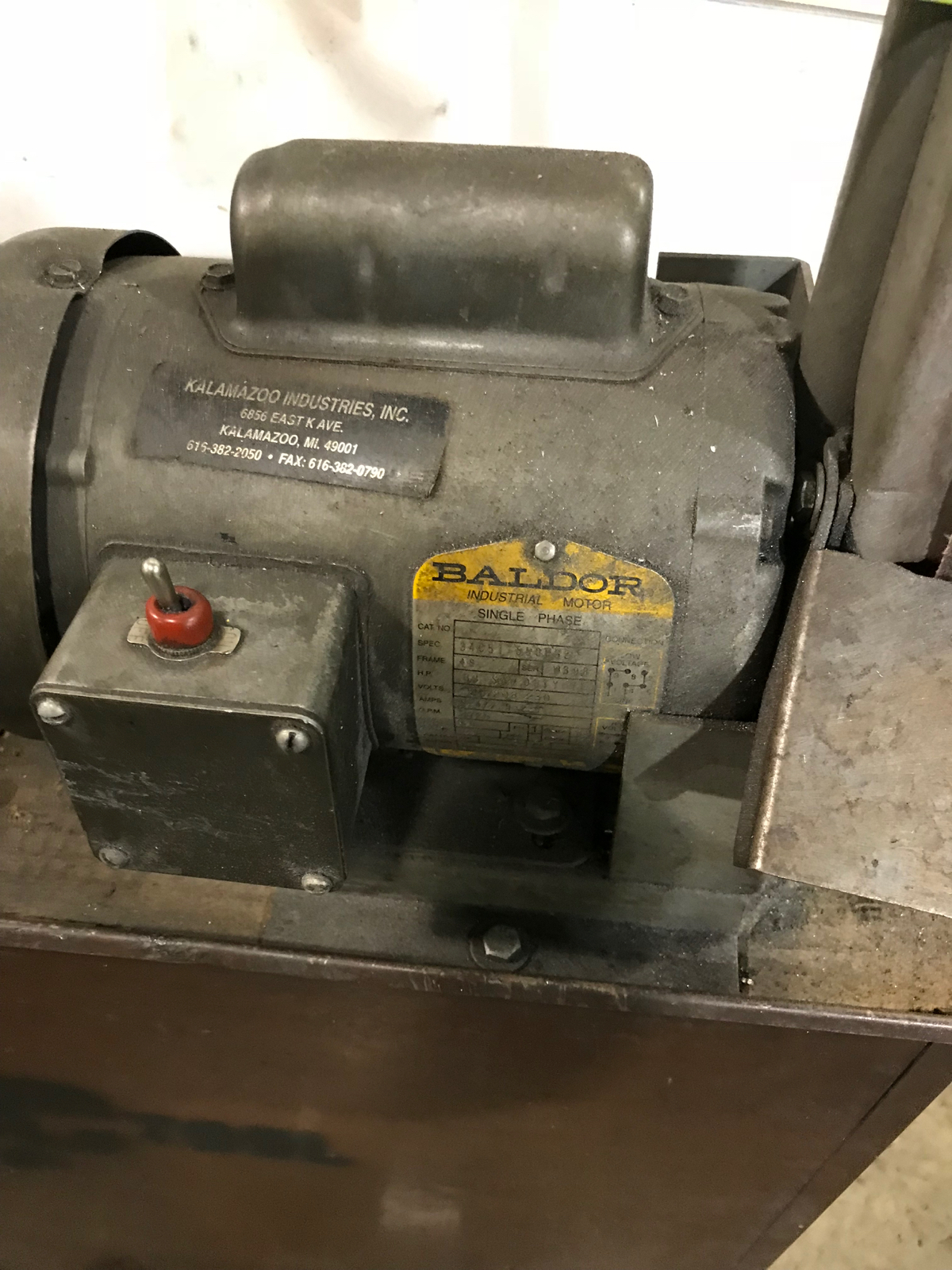 Baldor 1 inch belt sander with metal bench