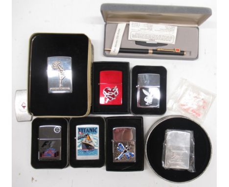 Collection of Zippo and other lighters, incl. Zippo '1935 Varga Girl' with tin, F1, Playboy, Titanitc, etc. (qty) 
