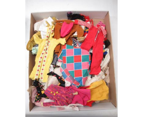Large collection of dolls clothes including modern and vintage Sindy 