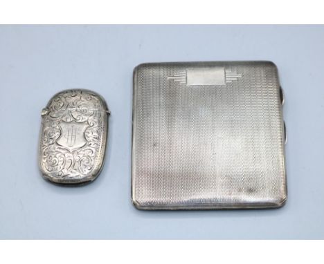 20th Century silver cigarette case with engine turned pattern and gilt interior by Frederick Field, Birmingham, 1935, and a V