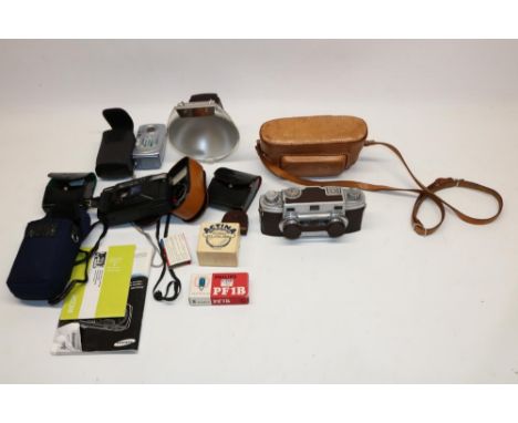 Revere Stereo 33 camera with leather case, Revere Model 24 flash gun, and other later cameras and photography equipment 