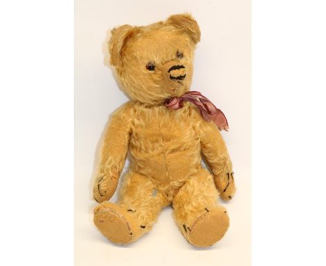 1930s Chad Valley golden mohair straw filled teddy bear with jointed arms and legs and swivel head, L42cm 