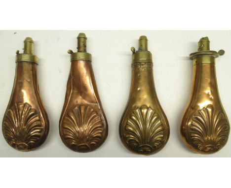 G &amp; J.W. Hawksley copper and brass embossed powder flask, decorated with shell motif, 20.5cm and three similar 