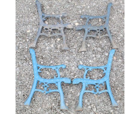 Two sets of child’s bench/seat ends in cast metal. 50cm high 