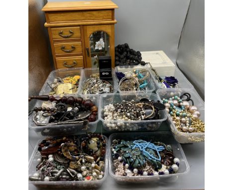 Large collection of costume jewellery including a vintage L'ancome Poem gilt cuff, beaded necklaces, bracelet rings etc. and 