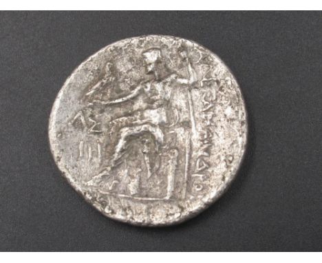Alexander III of Macedonia (336-323BC) Tetradrachm, obv. right-facing head of Hercules wearing a lion skin, rev. seated figur