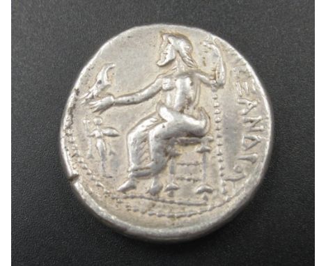 Alexander III of Macedonia (336-323BC) Tetradrachm, obv. right-facing head of Hercules wearing a lion skin, rev. seated figur