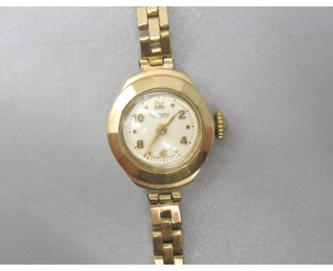 Ladies gold Rotary wristwatch, case stamped 375, with dedicated engraving to back, on 9ct yellow gold link bracelet, stamped 