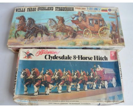 Two vintage unstarted horse and coach/cart plastic model kits to include Lindberg 1/16 Wells Fargo Overland Stagecoach (most 