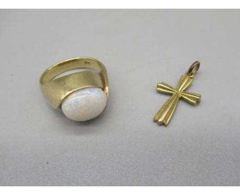 9ct gold ring set with opal, stamped 9ct, size J1/2, and a 9ct yellow gold crucifix pendant, 5.4g 