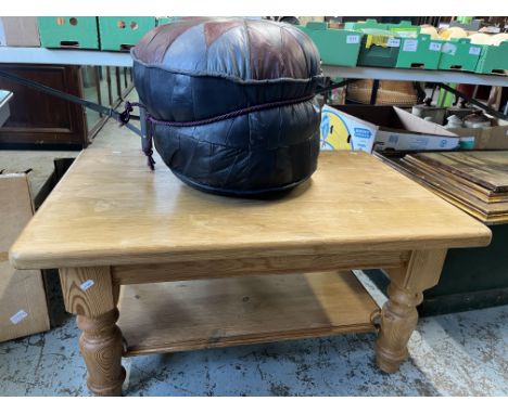 Leather pouffe, H35cm, and a pine two tier coffee table, turned supports, 92cm x 63cm H47cm (2)