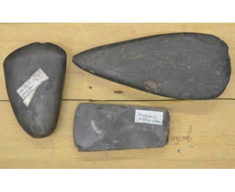 Three neolithic stone and flint hand axe heads, largest L17cm (Victor Brox collection) 