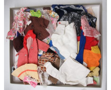 Large collection of dolls clothes including modern and vintage Sindy 