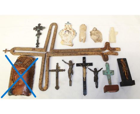 Collection of religious fragments of various ages and styles, to include a copper alloy cruciform brooch in the Anglo-Saxon s