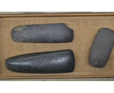 Three neolithic stone hand axe heads, largest L18cm (Victor Brox collection) 