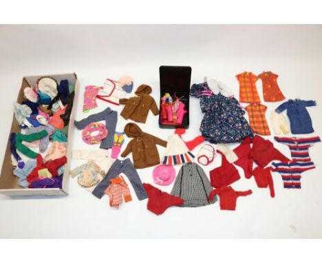 Large collection of dolls clothes and shoes including modern and vintage Sindy 