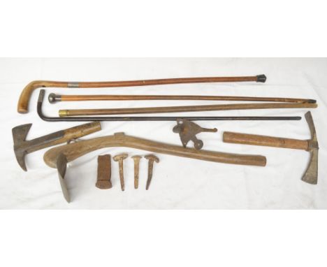 Collection of vintage tools and walking sticks to include a hoe, fireman's axe etc. (Victor Brox collection) 
