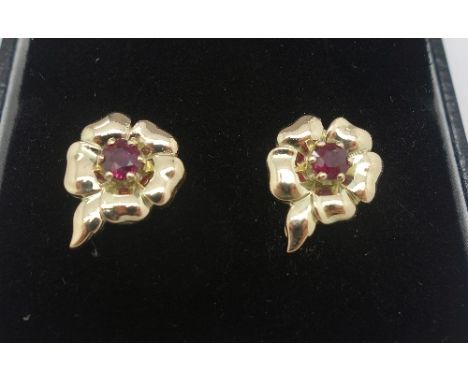 A pair of 9ct gold and ruby stud earrings