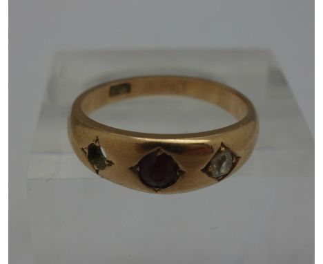 An 18ct gold, ruby and diamond ring, weight 4.6g, size P, lacking one stone