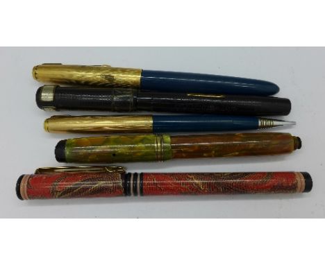 A Parker Duofold pen with 18ct gold nib, a/f, a Blackbird pen with 14ct gold nib, a/f, a Parker pen and pencil set and a Wate