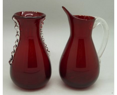 A 1950's ruby red Whitefriars glass flanged vase by Geoffrey Baxter, pattern 9420 and a 1950's Whitefriars glass jug, pattern