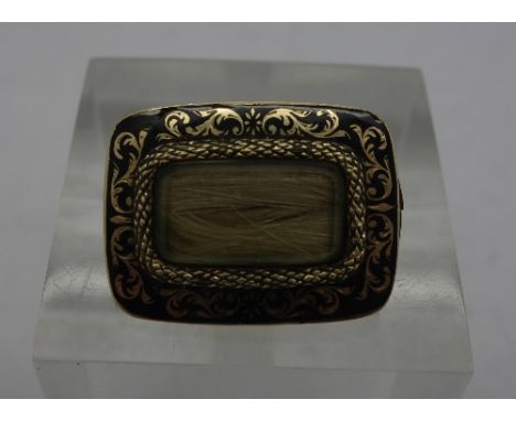 A gold and enamel mourning brooch, weight 3.2g