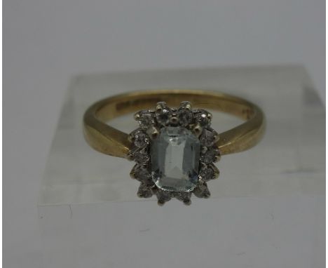 A 9ct gold, diamond and blue stone ring, weight 2.6g, size L