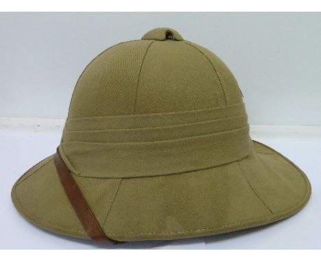 A World War II helmet with bag