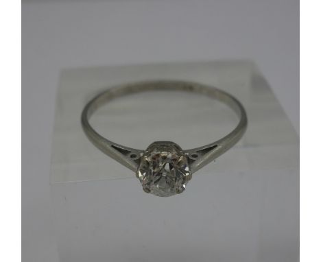 A 1920's platinum and diamond solitaire ring, approximately 0.65ct diamond weight, size T, weight 2.1g