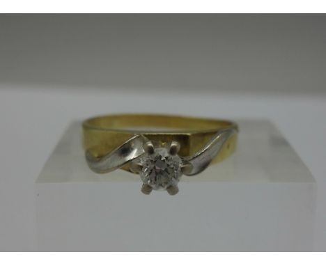 An 18ct gold and diamond solitaire ring,