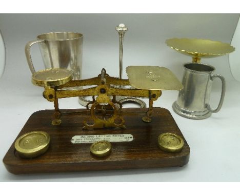A set of postal scales, two tankards, cruet stand and brass dish
