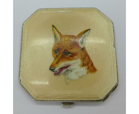A silver and enamel compact decorated with a foxes head, enamel a/f