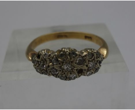 An 18ct gold and diamond ring, weight 4g, size R, lacking two stones