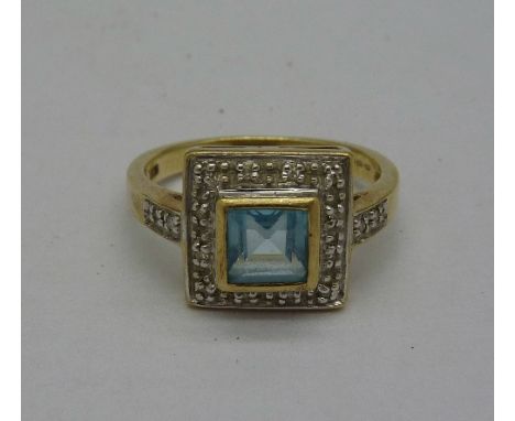 A 9ct gold, diamond and blue stone ring, weight 3g, size K