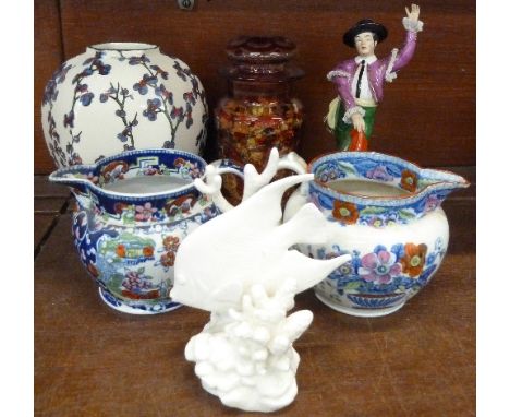 A Royal Doulton vase, a Bohemian glass lidded jar, a Royal Worcester Blue Angel figure, a/f, a Dresden Torero figure and two 