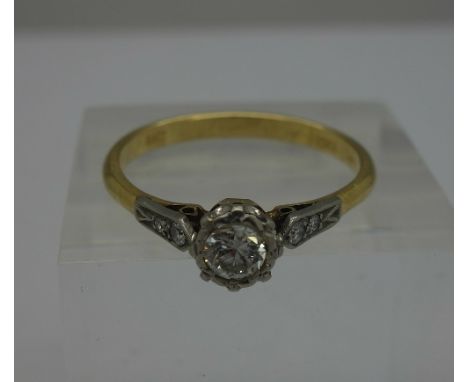 A c.1930's, 18ct gold and platinum set diamond solitaire ring, 0.3ct diamond weight, size T, weight 3.1g