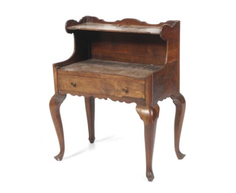 A Georgian mahogany  side cabinet. With 3/4 gallery rail and single shelf above a single drawer and shaped skirt raised on ca