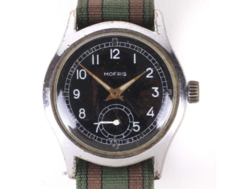 A Moeris military issue 'ATP' wristwatch. The circular black dial with white Arabic numerals denoting hours, seconds subsidia